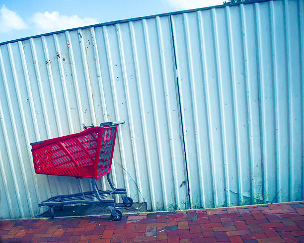 Cheltenham Township, Pennsylvania, PA, USA - October 10, 2017: Empty Walmart shopping carts are left abandoned at a bus stop.