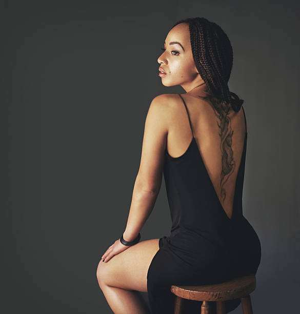Studio shot of a beautiful young woman posing against a gray backgroundhttp://195.154.178.81/DATA/i_collage/pi/shoots/805928.jpg