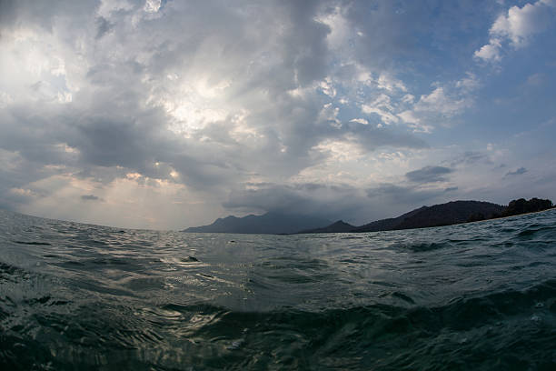 istock Beams of Sunlight and Rain Clouds 498253578