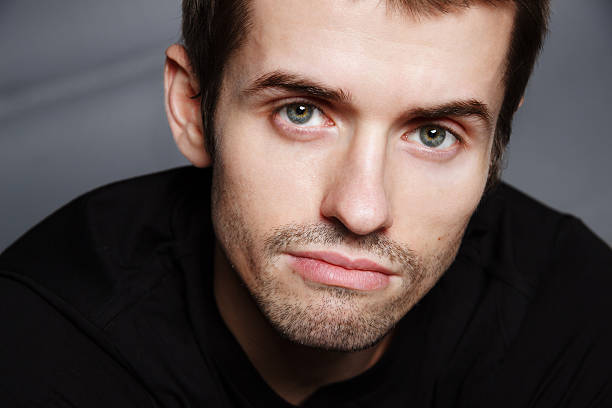 istock portrait of a handsome serious man 498260216