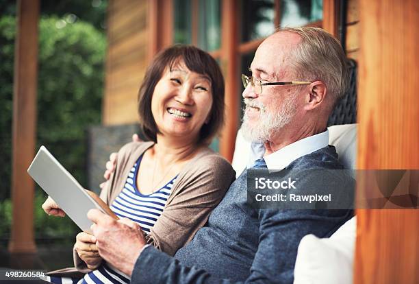 Couple Adult Happiness Laughing Holiday Concept Stock Photo - Download Image Now - Senior Couple, Asian and Indian Ethnicities, Happiness