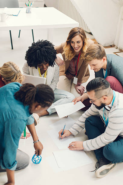 istock Startup Team Brainstorming On The Floor. 498271368