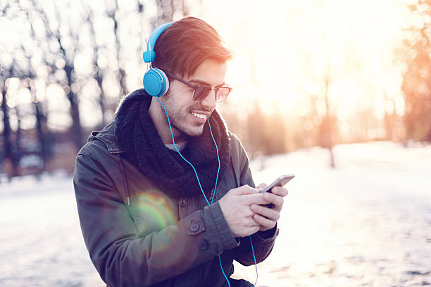 istock Happy man on the phone texting 498277682