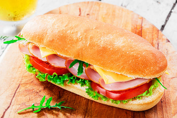 istock sandwich with ham and cheese and tomatoes 498277703