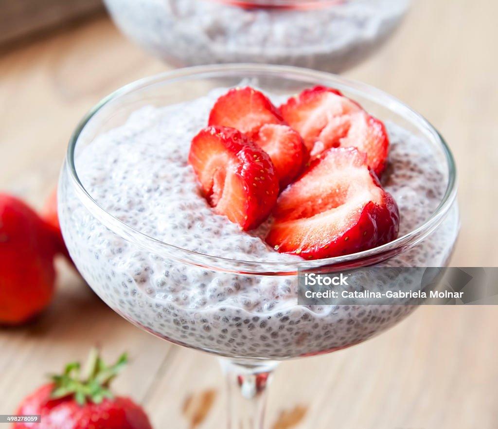 Chia Pudding with Strawberry Chia Pudding with Strawberry in Transparent Glasses Backgrounds Stock Photo