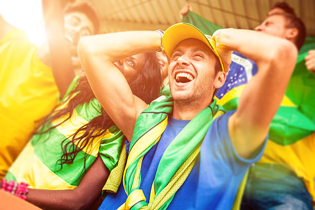 istock Brazilian fans during a soccer match 498281273
