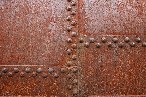 Photo of Rusty steel rivets