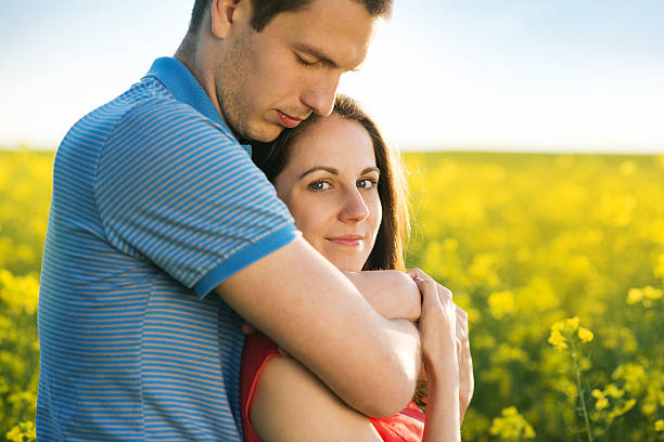 istock Couple in love in field 498284845