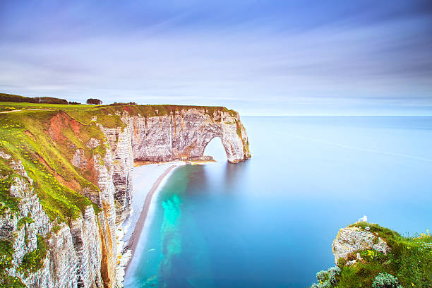 istock Etretat, Manneporte natural rock arch and its beach. Normandy, F 498285305