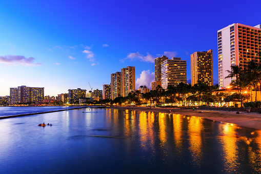 View of Honolulu and Waikiki Beach at night; Hawaii, USA