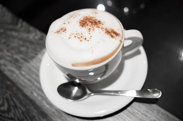 istock Cup of coffee with milk foam and cinnamon 498286008