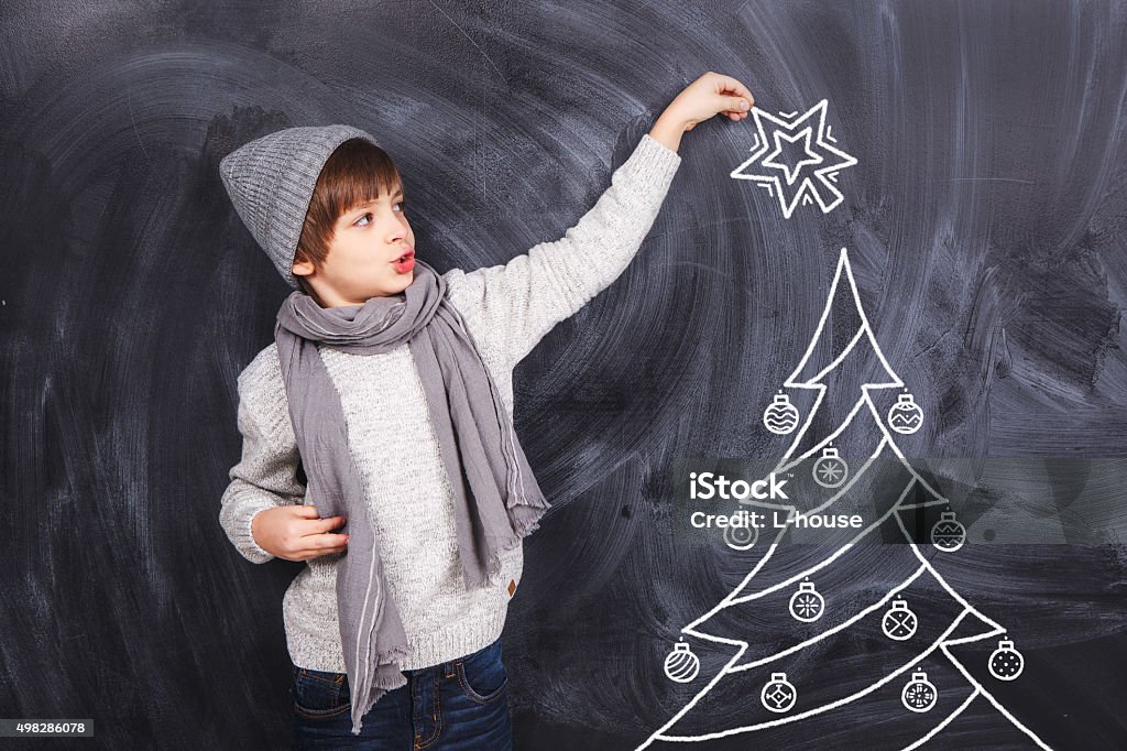 Thoughts about new year Thoughts of children against the black chalkboards 2015 Stock Photo