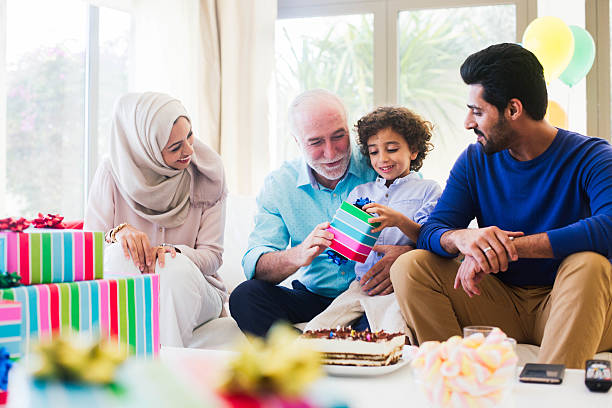 istock Three generation family celebrating a birthday in Dubai. 498296940
