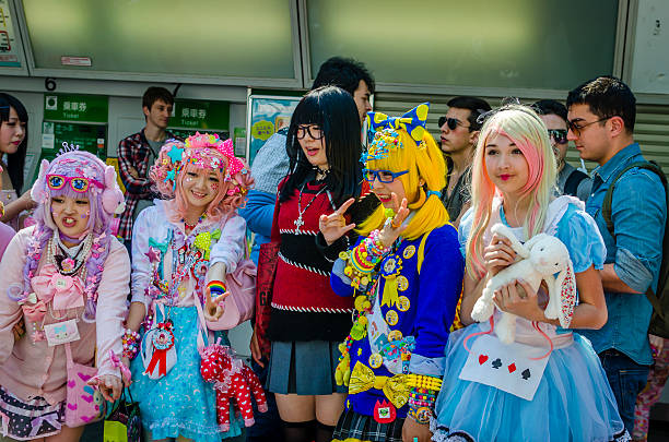 Japanese costume players at Harajuku, Tokyo Tokyo,Japan - April 27, 2014: Every Sunday at Harajuku , many young people engage in cosplay , dressed up in excentric costumes to resemble anime characters, punk musicians. tokyo harajuku stock pictures, royalty-free photos & images