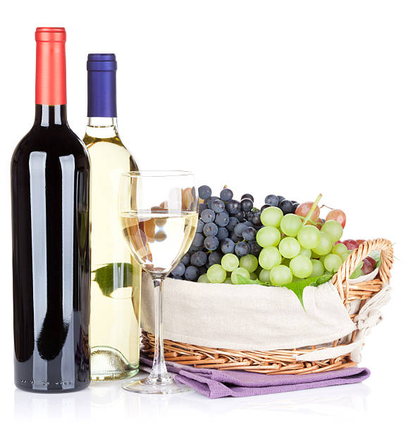 istock White and red wine bottles and grapes 498301302