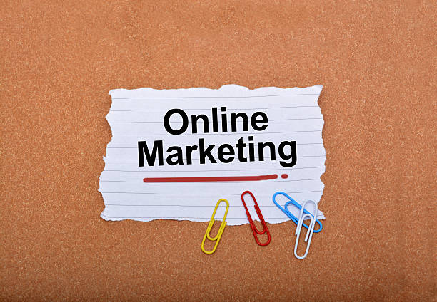 istock Online Marketing wrriten on paper note with paper pins 498302630
