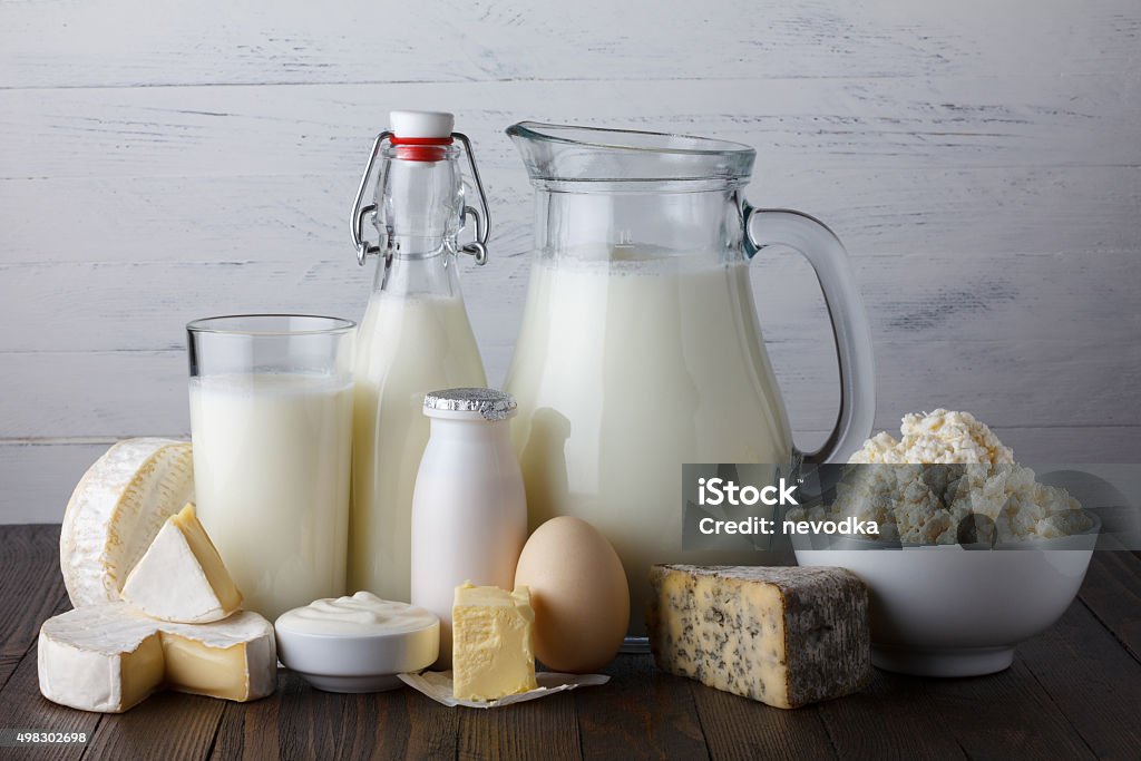 Dairy products on wooden table Dairy products on wooden table still life Dairy Product Stock Photo