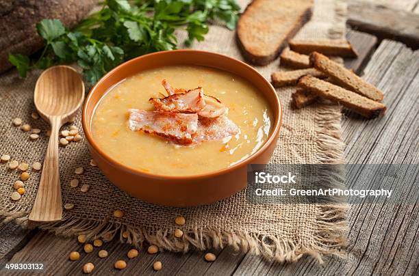 Traditional German Homemade Pea Soup Preparation Recipe With Bacon Greens Stock Photo - Download Image Now