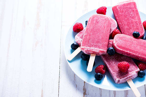 istock Refreshing popsicle with berry fruits 498304994