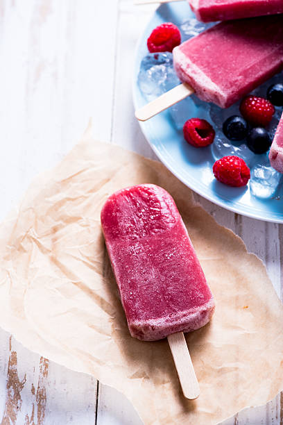 istock Refreshing popsicle with berry fruits 498305158