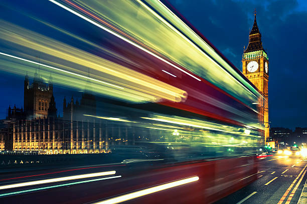 istock Bus crossing the bridge in front of Big Ben 498305260