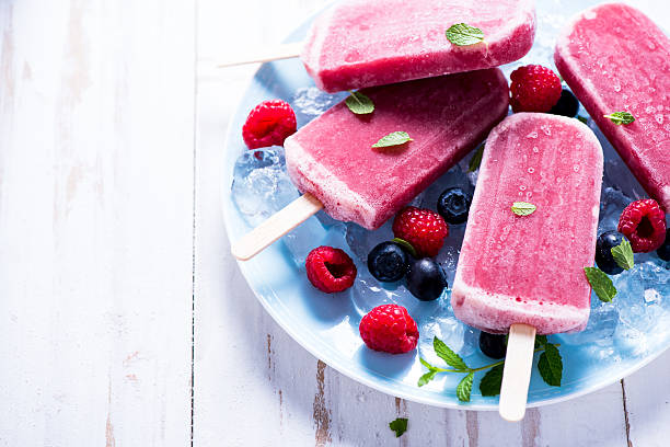 istock Refreshing popsicle with berry fruits 498305334