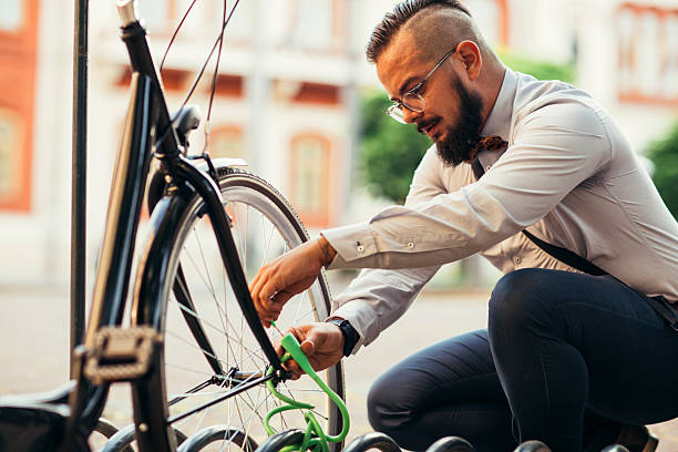 istock Businessman Parking His Bycycle. 498307726