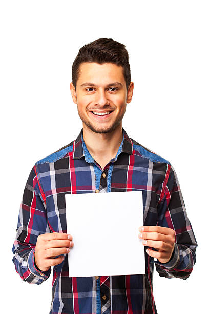 istock Teen  holding blank white paper 498311052