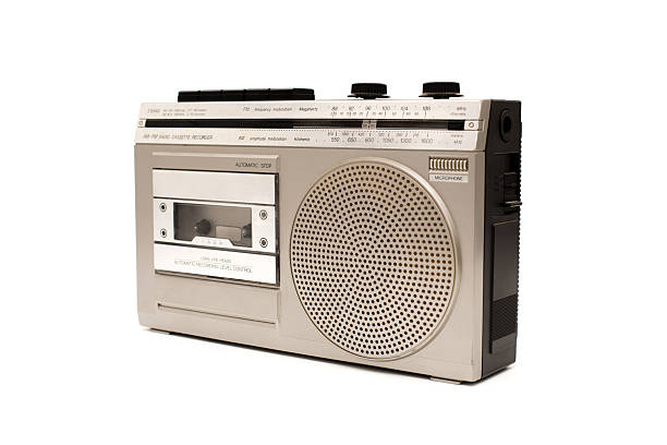 1980s Silver retro radio boom box on color background.