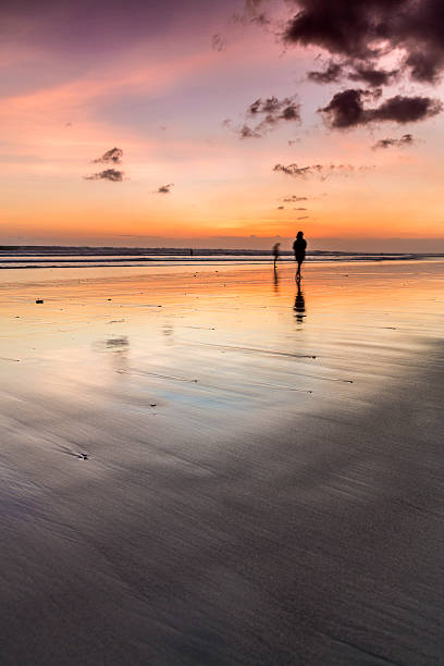 istock Sunset on the beach at low tide 498315091