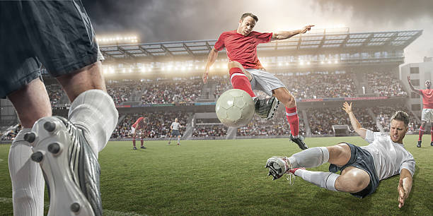 istock Soccer Players Mid Air Action 498315407