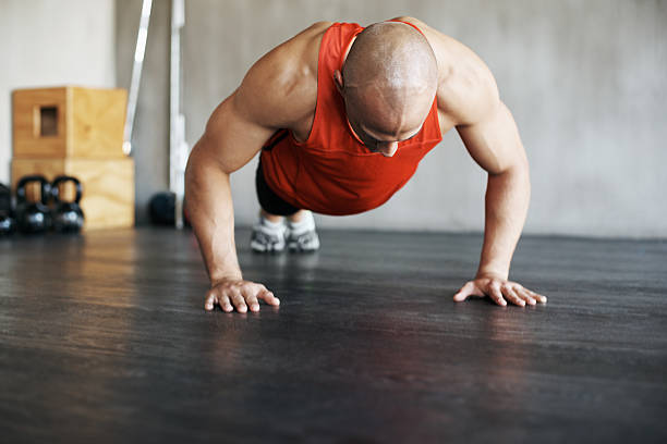 istock Improving his upper body strength with a few push-ups 498315685