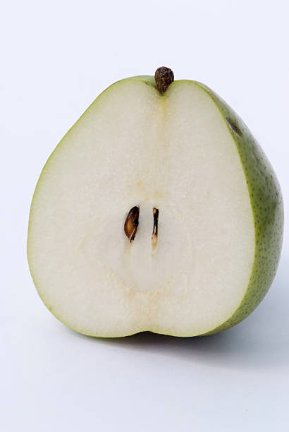 istock Fresh green pear the cut closeup macro 498316997