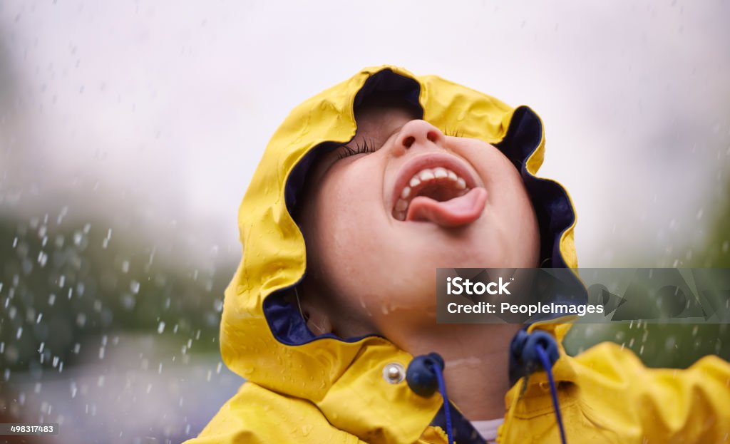 Taste of mother nature A little girl having fun in the rainhttp://195.154.178.81/DATA/i_collage/pi/shoots/783464.jpg Child Stock Photo