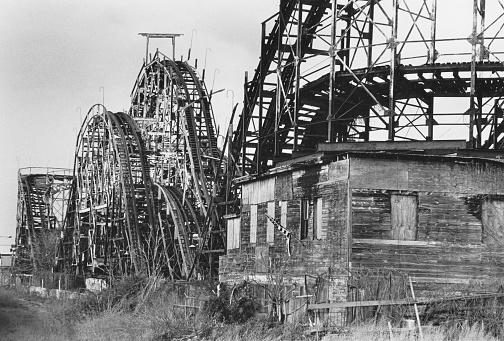 This rotting, dilapidated wooden roller coaster which was built in the 1920's, operated until the 1980's at Coney Island in New York City, named the Thunderbolt it was torn down in 2008. It was unique because of the house underneath the track where the owners, now deceased lived.