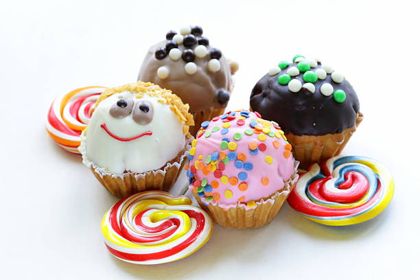 holiday desserts, different decorated cupcakes on white background