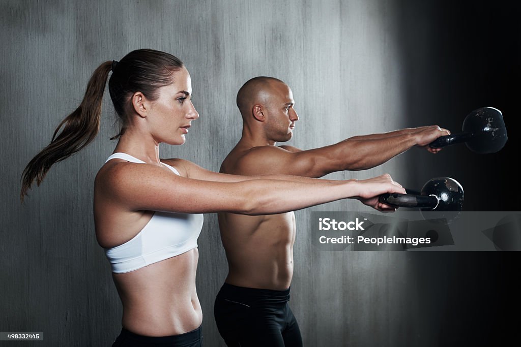 Strength, balance and harmony Cropped shot of a young man and woman working outhttp://195.154.178.81/DATA/i_collage/pi/shoots/783431.jpg Couple - Relationship Stock Photo