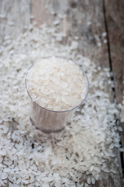 istock rice in bowl on wooden background 498332478