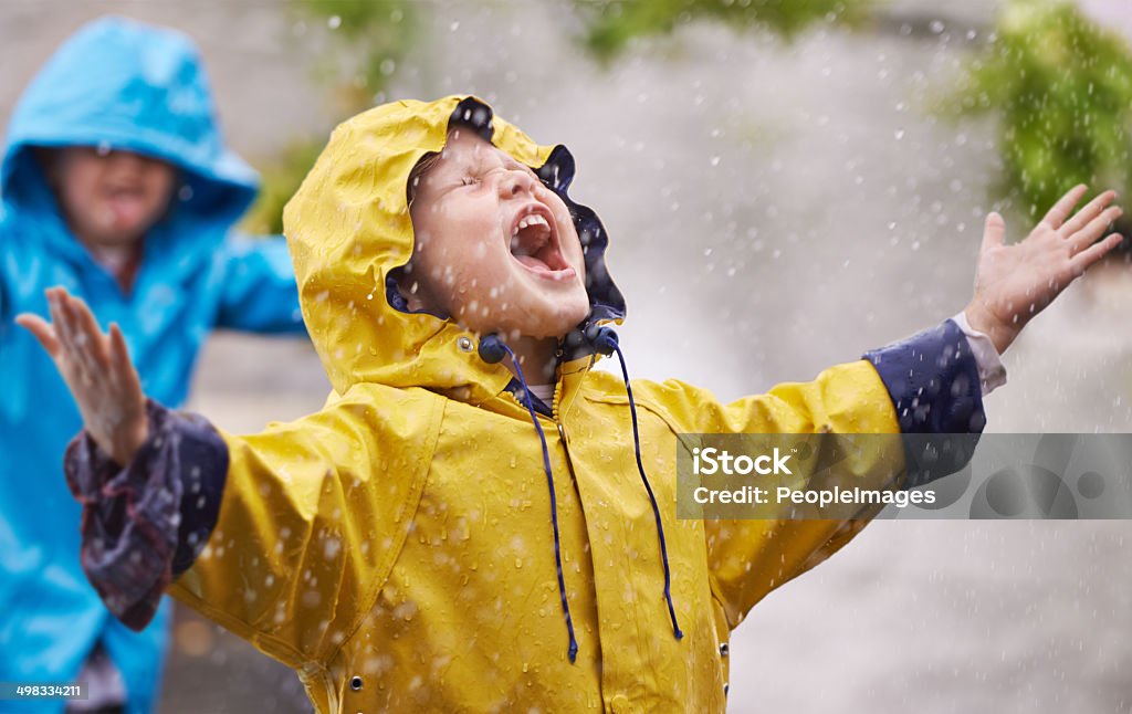 They love the rain Shot of a young brother and sister playing in the rainhttp://195.154.178.81/DATA/i_collage/pi/shoots/783464.jpg Child Stock Photo