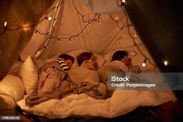 Sleeping In Our Imaginary Tent Stock Photo - Download Image Now - Slumber Party, Child, Sleeping
