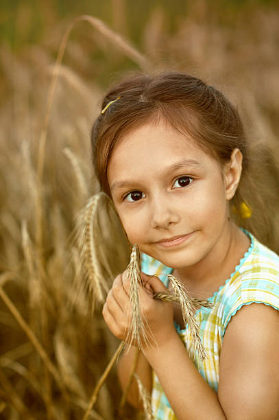 istock Girl in field 498335938