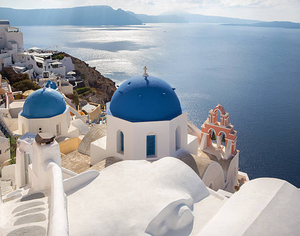 istock Santorini - The church cupolas in Oia over the caldera. 498336696