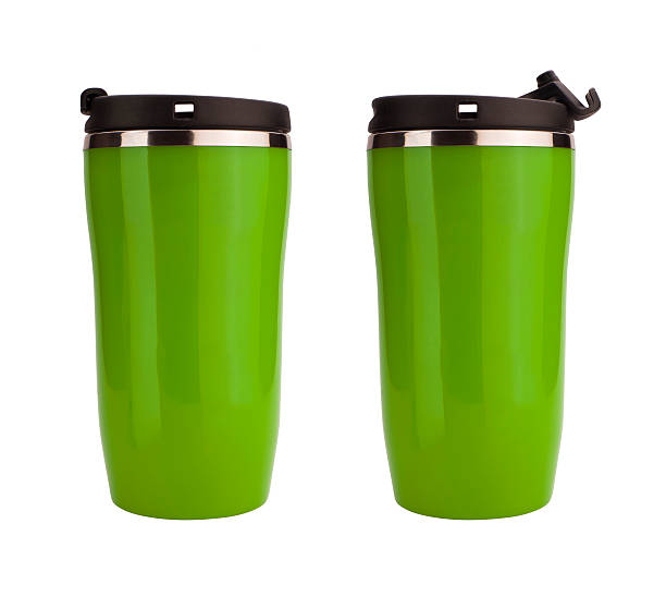 istock Green coffee flask isolated on white 498337560