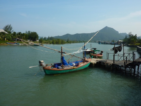 Traditional colourful fishing boats at Bang Pu Village, part of Khao Sam Roi Yot National Park.