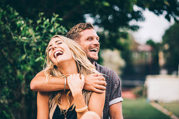 feliz y en amor - couple young women cheerful outdoors fotografías e imágenes de stock
