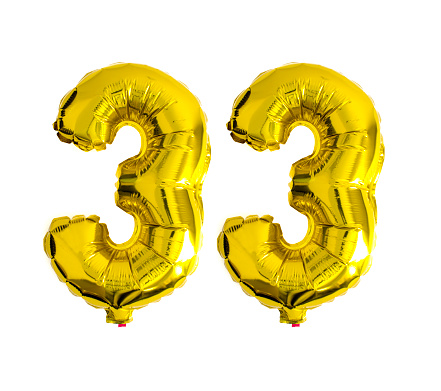 Number 33 written with helium foil balloons