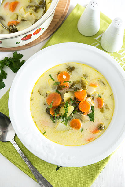 istock Polish sorrel and spring vegetable soup 498340528