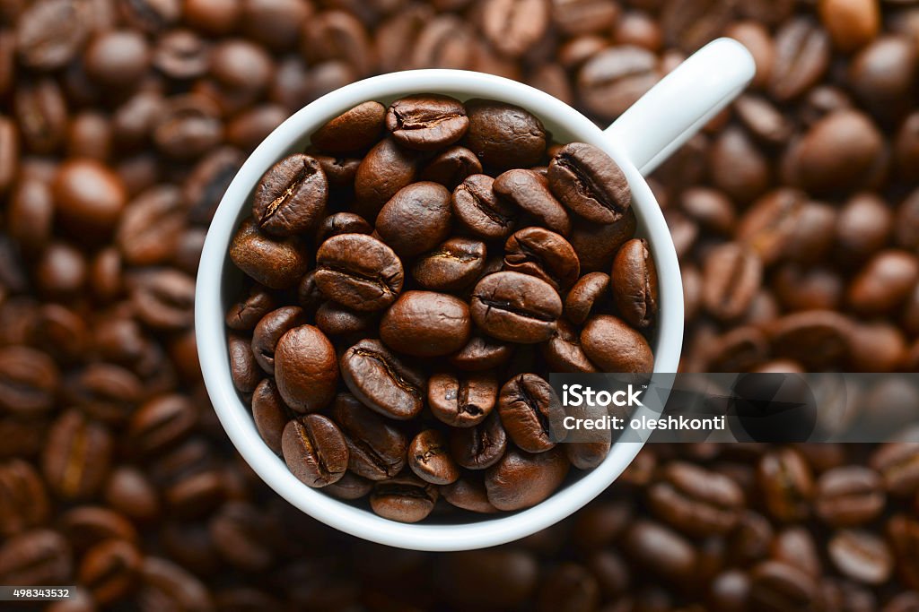 coffee grains in a white mug 2015 Stock Photo