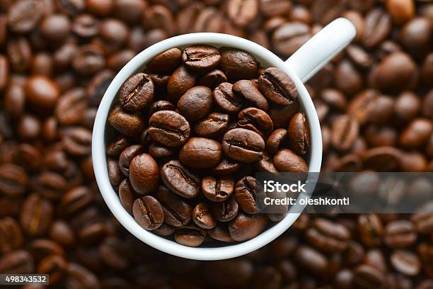 Coffee Grains In A White Mug Stock Photo - Download Image Now - 2015, Backgrounds, Breakfast