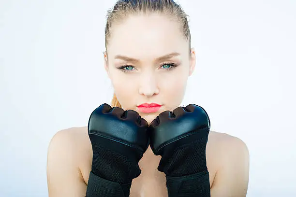 Beautiful UFC Women Fighter Posing With Her Gloves On.